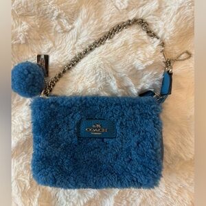 Coach Blue Shearling Pom Chain Wristlet